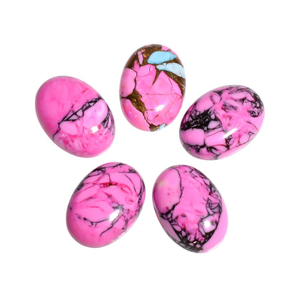 Light Pink Mohave Turquoise cabochon in oval shape, showing a delicate pastel pink that's softer than the standard Pink Mohave shade