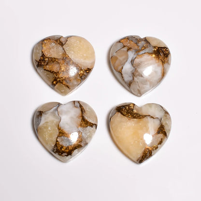 Loose turquoise gemstone hearts showing shiny gold copper veins and polished domed tops