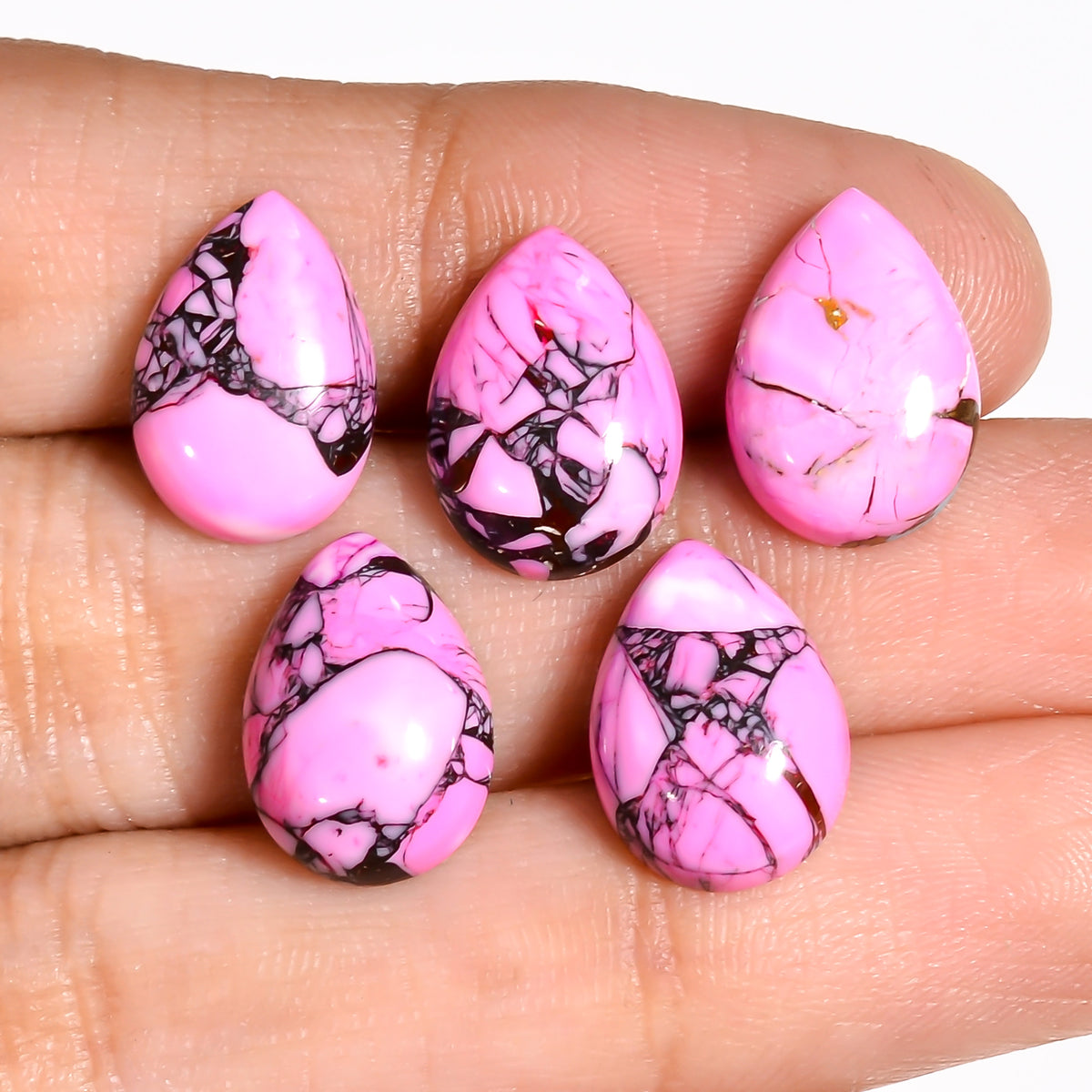 Pink Turquoise cabochon linked to turquoise spiritual meaning and emotional balance, a less common color variation within the turquoise family