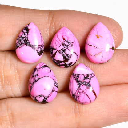 Pink Turquoise cabochon linked to turquoise spiritual meaning and emotional balance, a less common color variation within the turquoise family