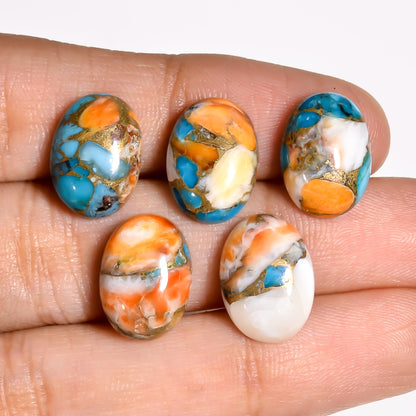Top down flat lay photo of the Multi Turquoise oval cabochon, styled simply to let the natural color blend take center stage