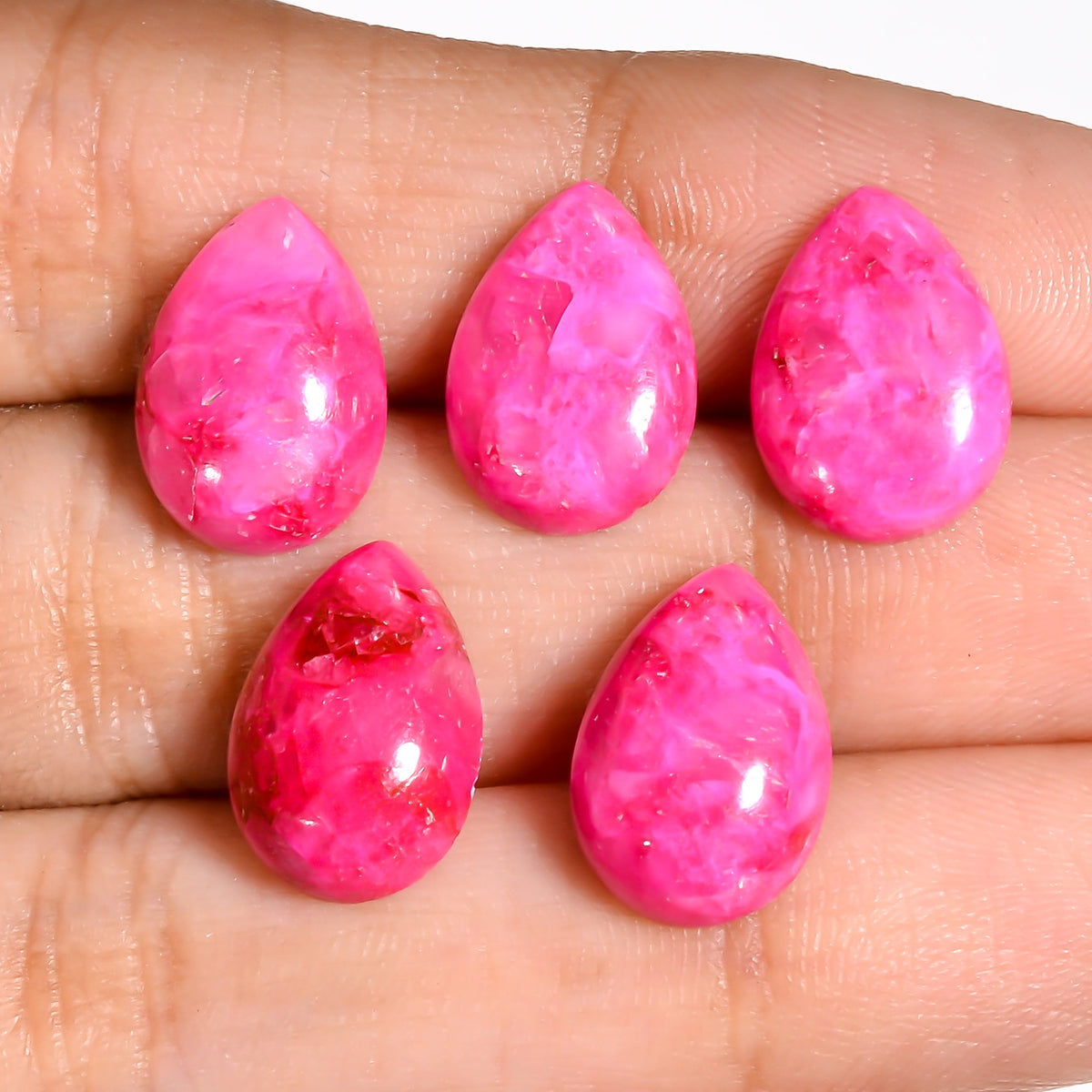 Loose Pink Turquoise gemstone priced per carat, offered in bulk quantities for wholesale buyers and jewelry making suppliers