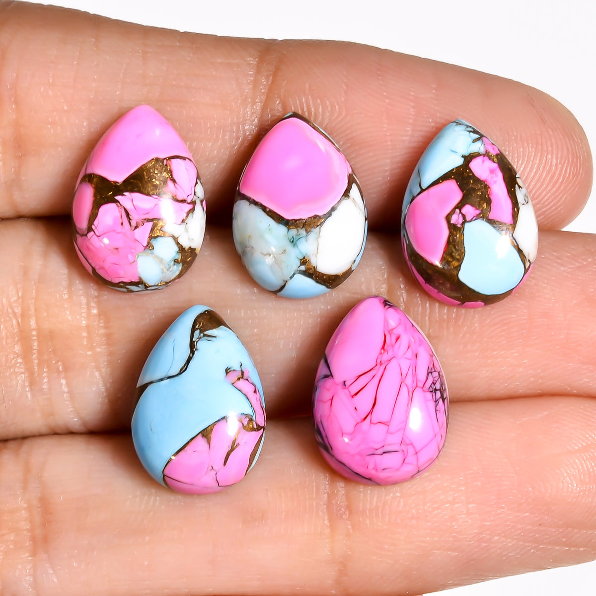 Pink Turquoise cabochon offered at wholesale pricing for jewelry suppliers sourcing loose gemstones in bulk for custom designs