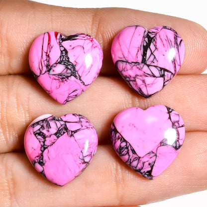 Pink Turquoise heart cabochon mocked up in a pendant setting, showing how the shape reads once suspended on a chain