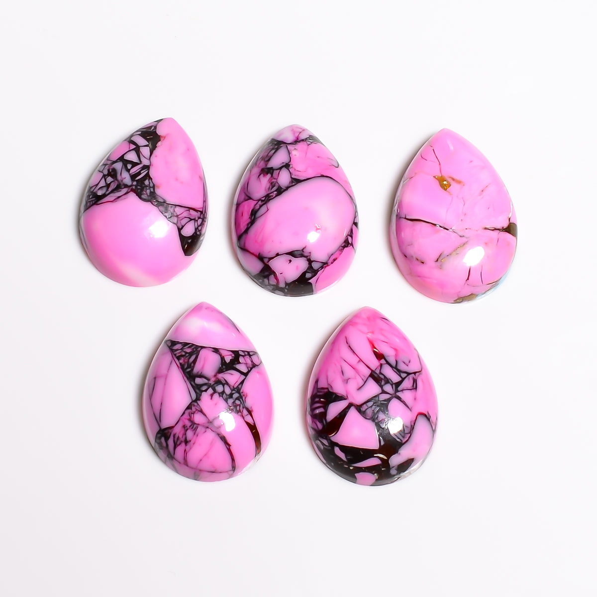 Loose Pink Spider Turquoise gemstone with a polished dome finish, cut for bezel set rings and drop pendant jewelry designs