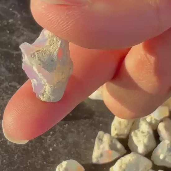 httpsarmoniagems.comproductsnatural-ethiopian-white-opal-rough-fire-play-24ct-crystal