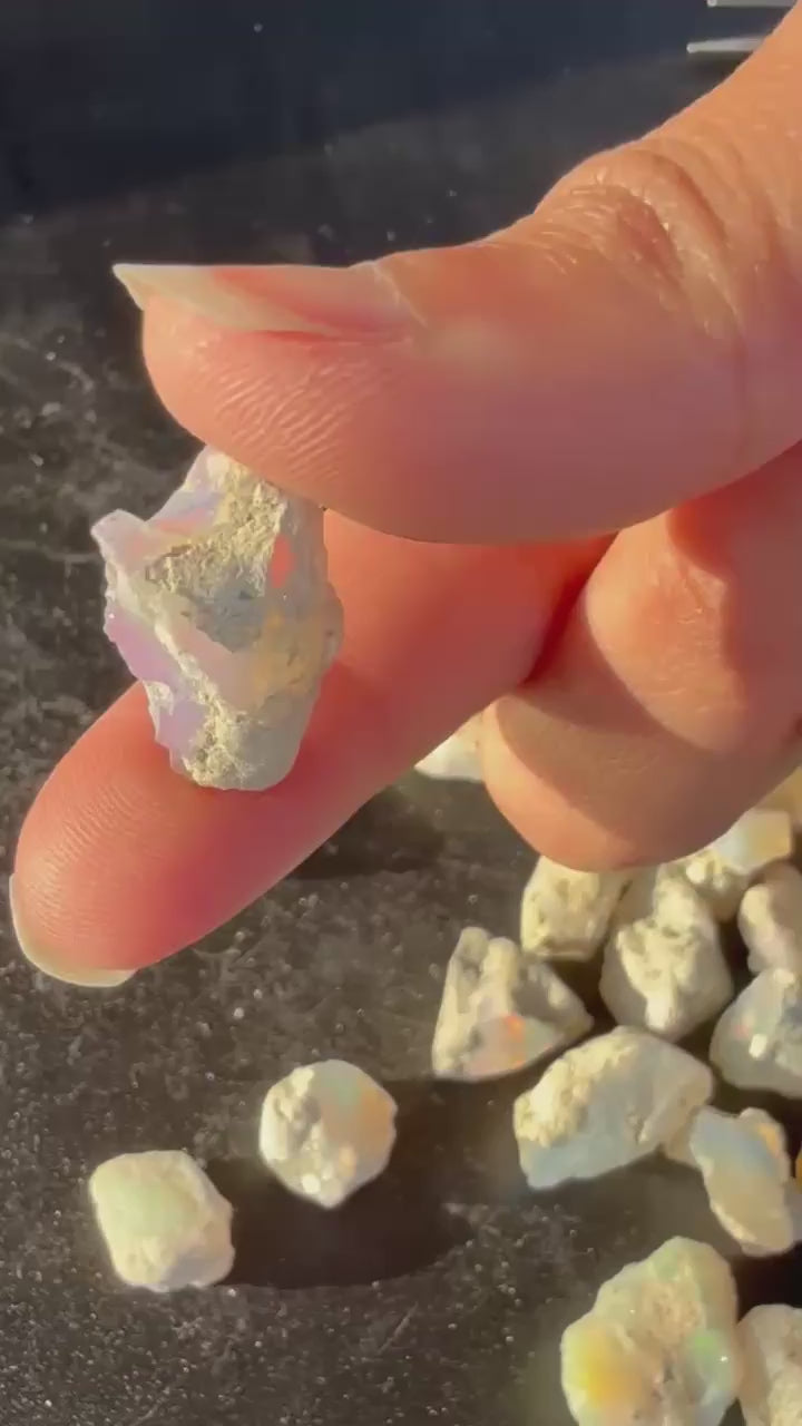 httpsarmoniagems.comproductsnatural-ethiopian-white-opal-rough-fire-play-24ct-crystal