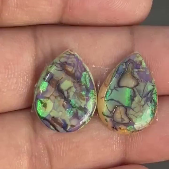 Pear shape matched pair of lab created opal cabochons
