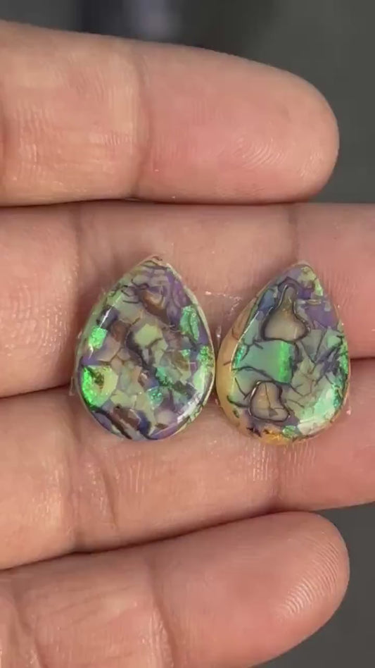 Pear shape matched pair of lab created opal cabochons