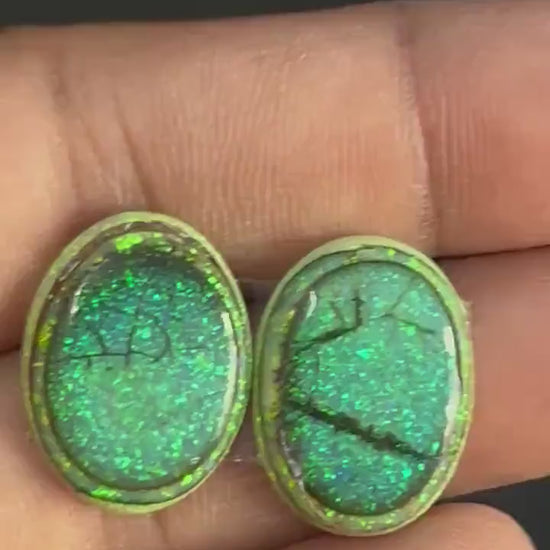 lab created Monarch opal cabochons in dark green with crackled black matrix and neon green flecks, flat back