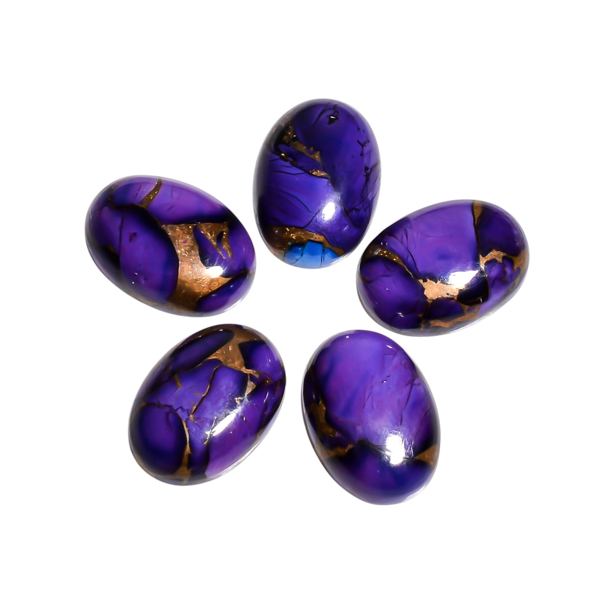 Purple Copper Turquoise cabochon in oval shape, showing a muted violet tone woven through natural dark matrix streaks