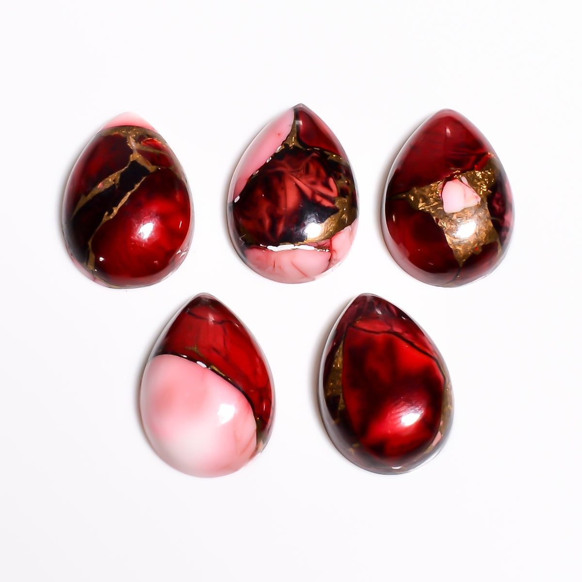 Red Turquoise cabochon suited for collector pieces and statement jewelry, valued for its unusual color within the turquoise family