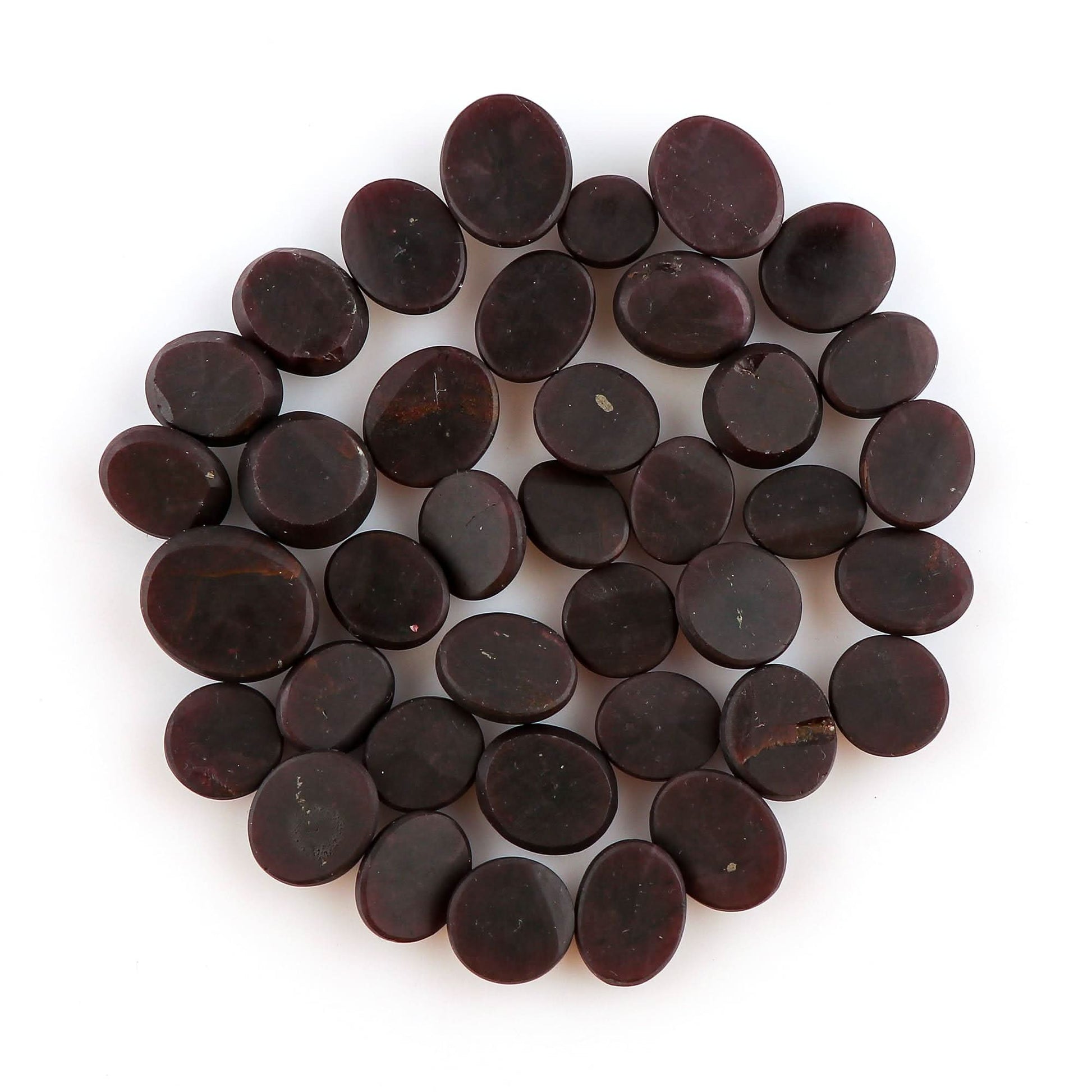 red garnet gemstone close up texture and natural shine
