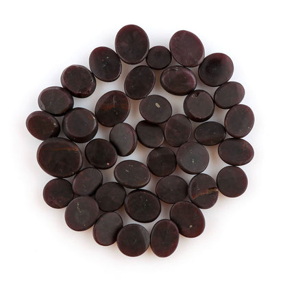 red garnet gemstone close up texture and natural shine