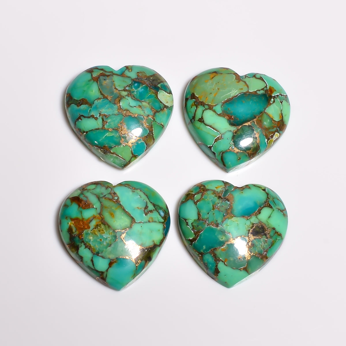 Green Spider Turquoise referenced in a broader turquoise authenticity guide, since strong spider web matrix is one sign of genuine natural material