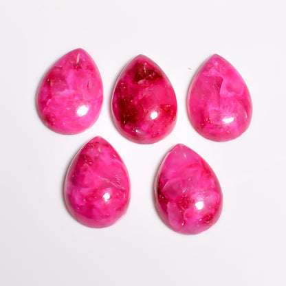 Pink Turquoise cabochon representing an uncommon shade within the December birthstone family, sought after for its distinct rosy color