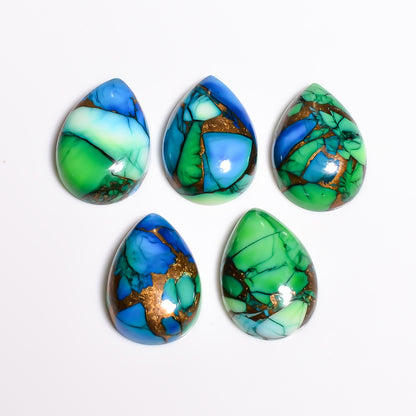 Teal colored Turquoise cabochon associated with turquoise crystal benefits like calm and balance, a shade between classic blue and green