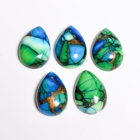 Teal colored Turquoise cabochon associated with turquoise crystal benefits like calm and balance, a shade between classic blue and green