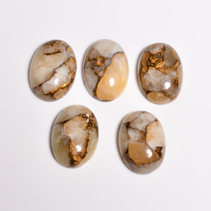 Gold Turquoise pictured within a broader crystal collection display, showing how it complements other earth toned gemstones on a shelf or altar