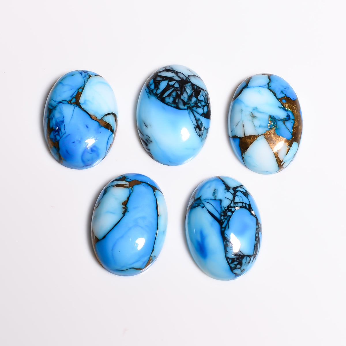 Violet Blue Turquoise styled as part of a matching jewelry set, showing how the color pairs across rings, necklaces and earrings