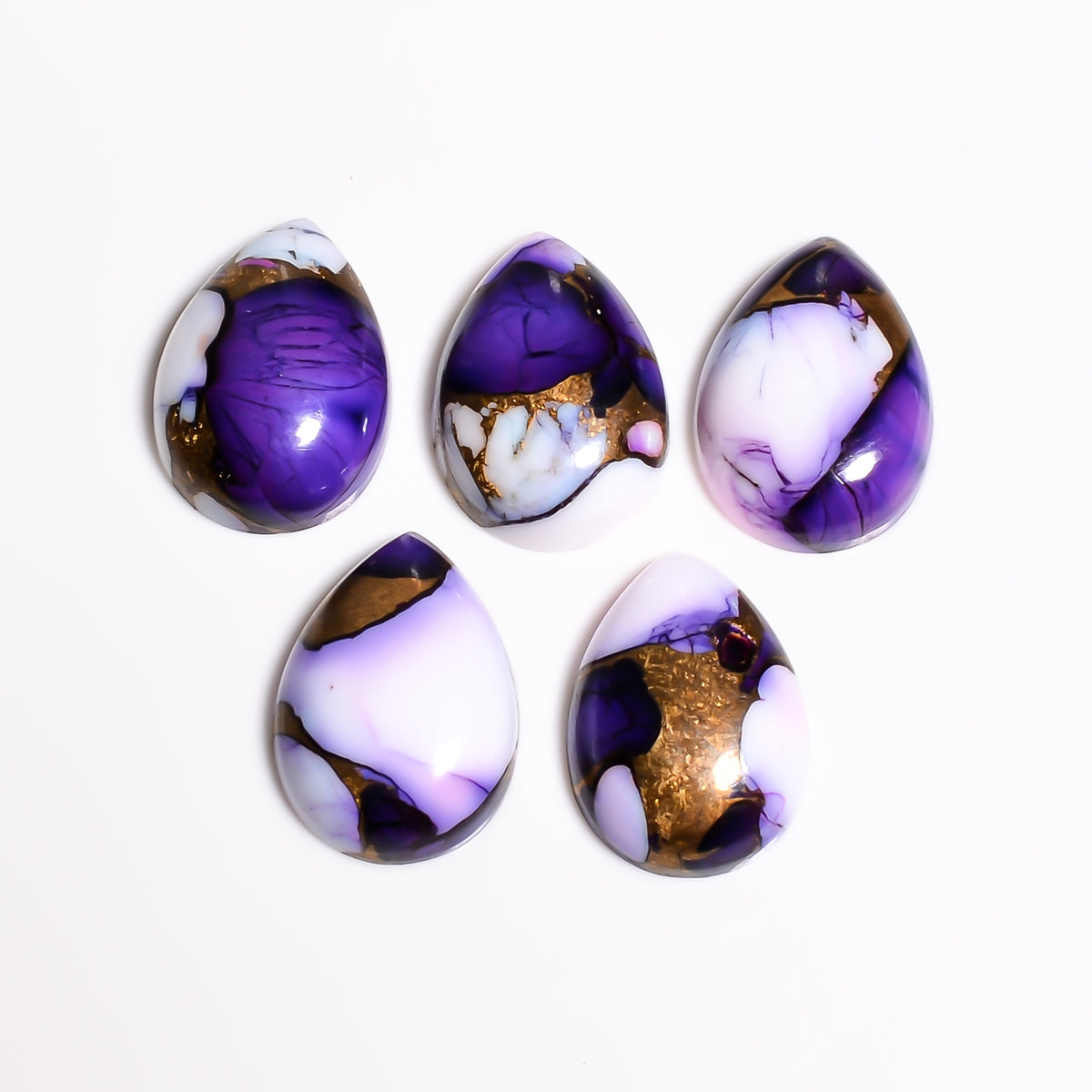 Loose Purple Turquoise gemstone suited for wire wrapping and pendant work, offering a distinctive alternative to classic blue turquoise